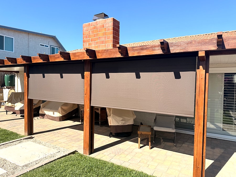Custom exterior shades installed beneath a Ventura County backyard pergola