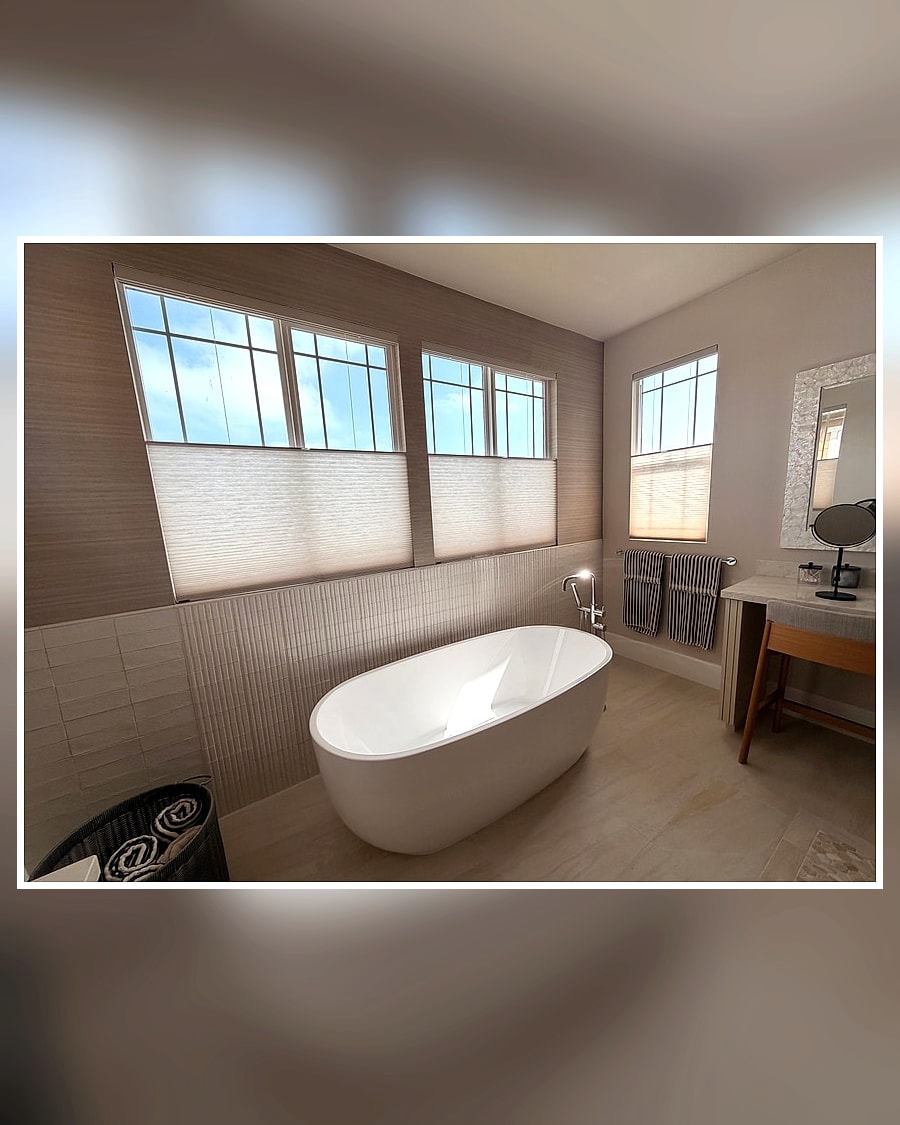 Top-down bottom-up cellular shades providing privacy in a Ventura County bathroom remodel