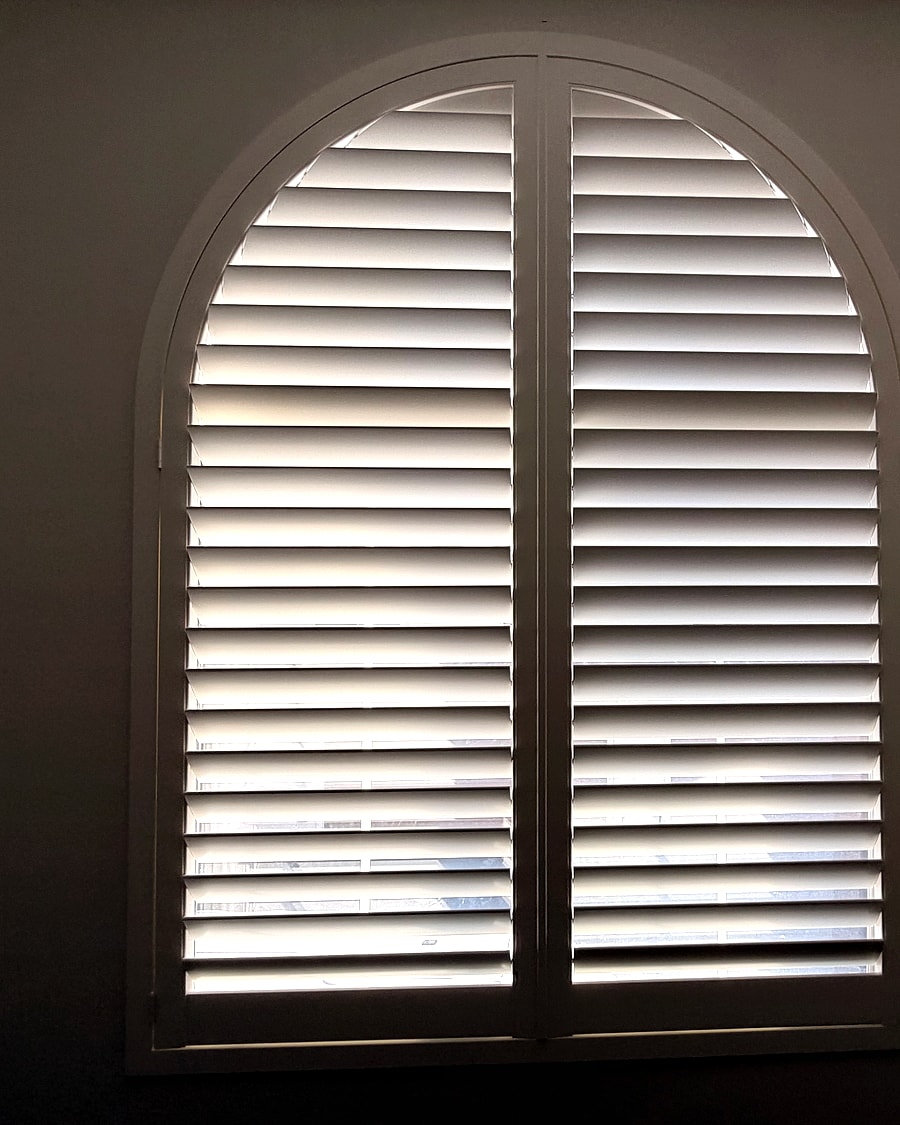 Single arched plantation shutter installed in a Ventura County home